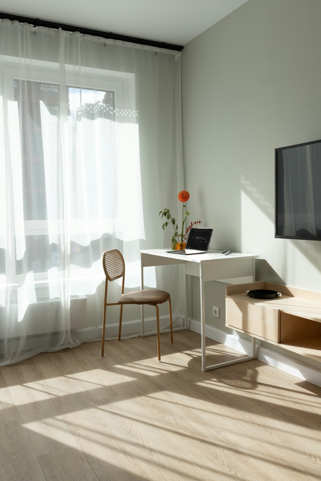 Bright minimalist Scandinavian office interior with wooden furniture