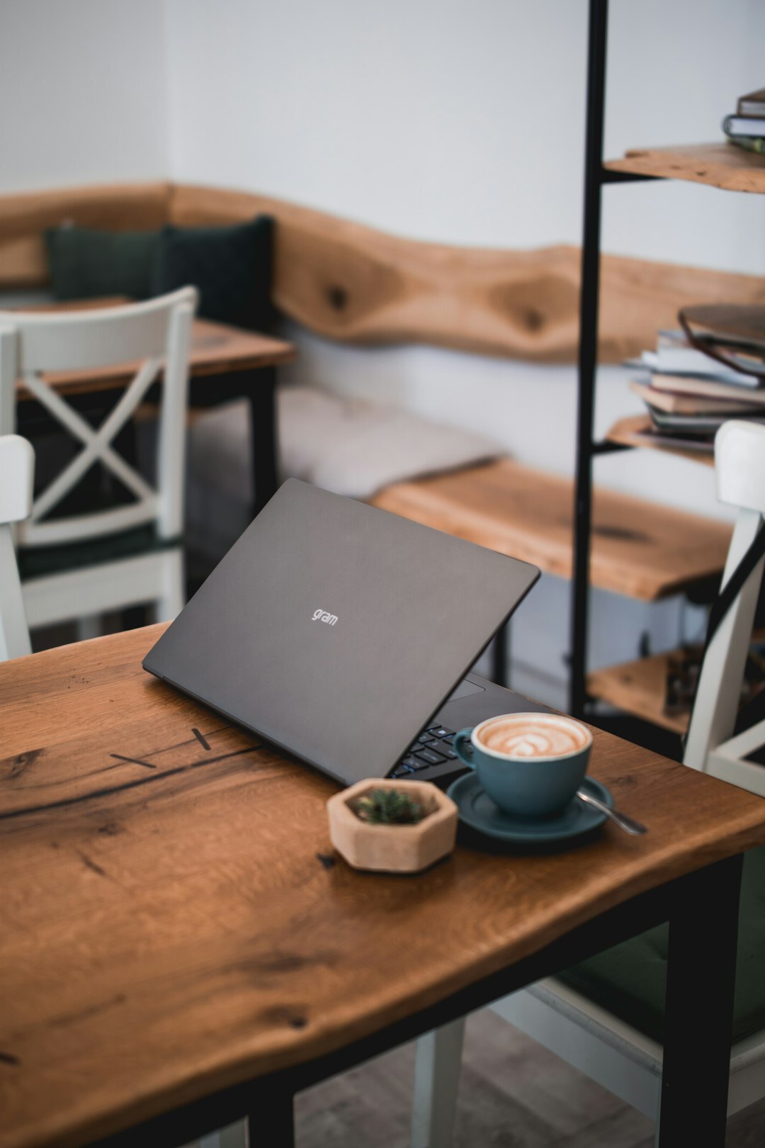 Danish business consultants meeting around a table with laptops